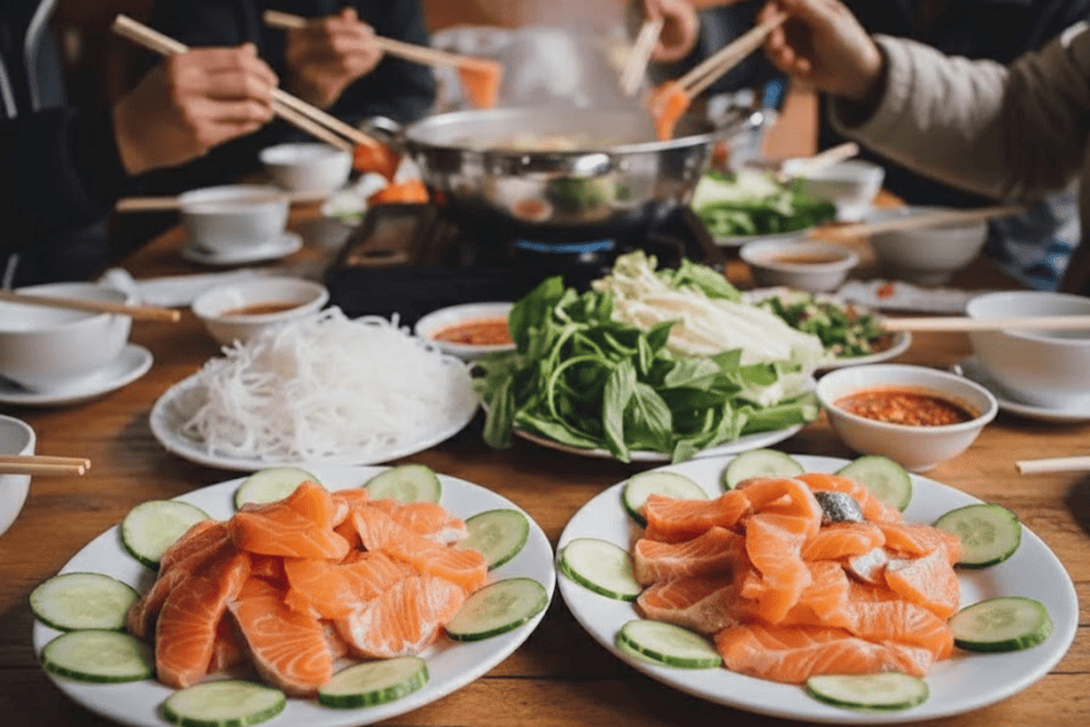 Sapa-style sturgeon hotpot simmering with native greens